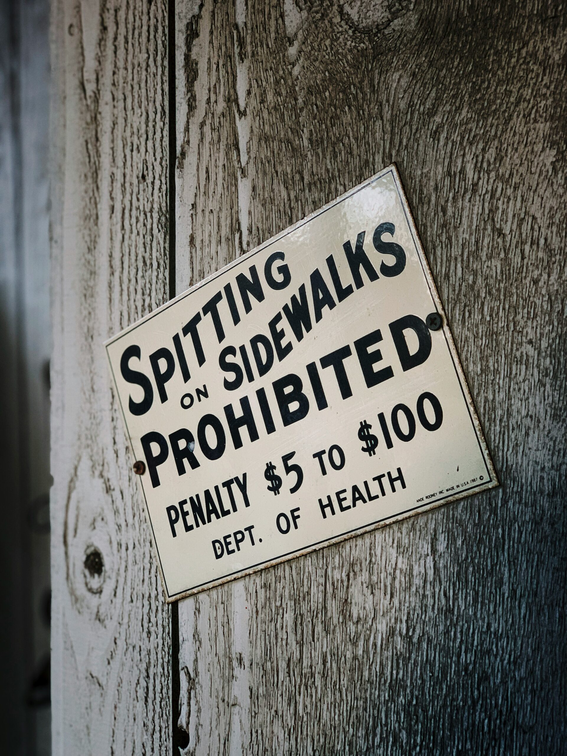 Rules: Spitting is prohibited! Sign.